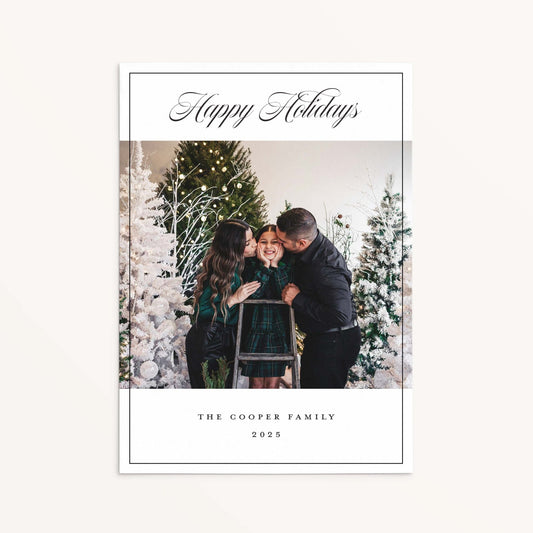 Chic family photo holiday card with black script Happy Holidays greeting and minimalist border.