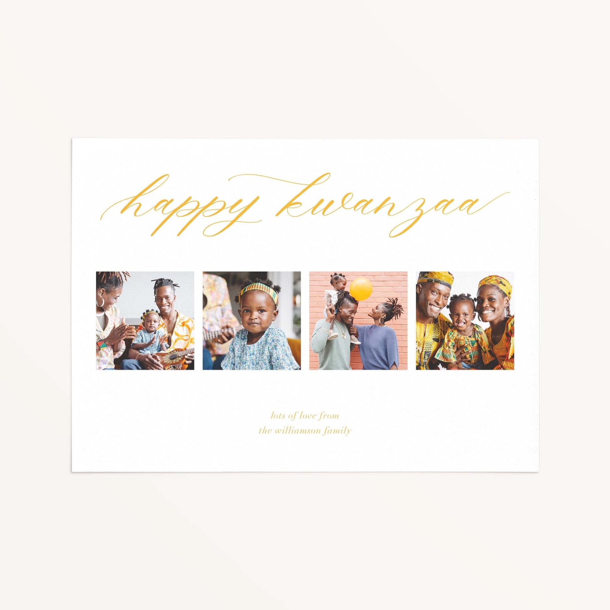 Elegant Four Photo Holiday Card with Happy Kwanzaa greeting and four family photos in a modern minimalist design.