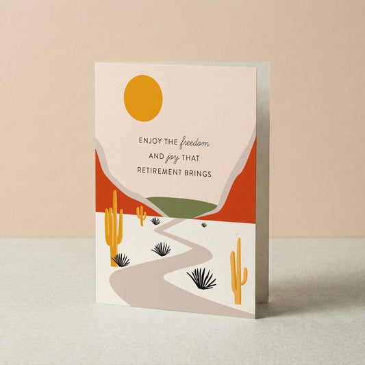 Greeting card with desert landscape design and retirement message on a beige background