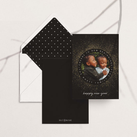 New Year Sparkle holiday photo card with black envelope and white sparkle patterned liner