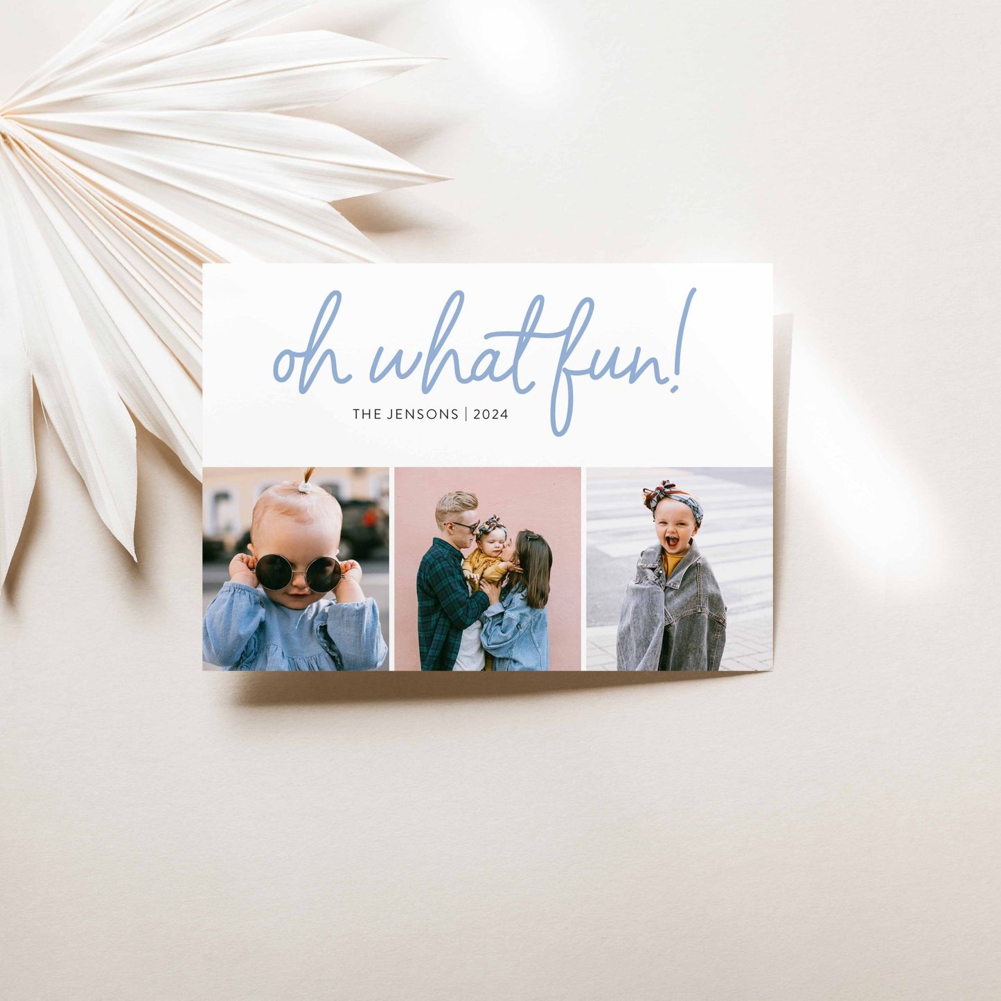 Modern Oh What Fun holiday photo card on beige background with soft natural light and minimal decor.