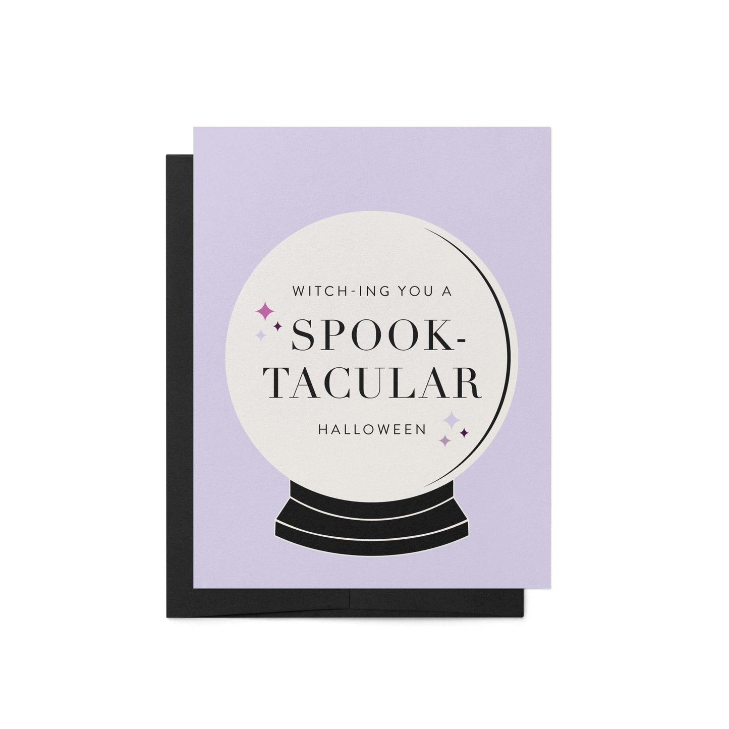 Spooktacular Halloween greeting card with witchy crystal ball design on lavender background paired with black envelope.