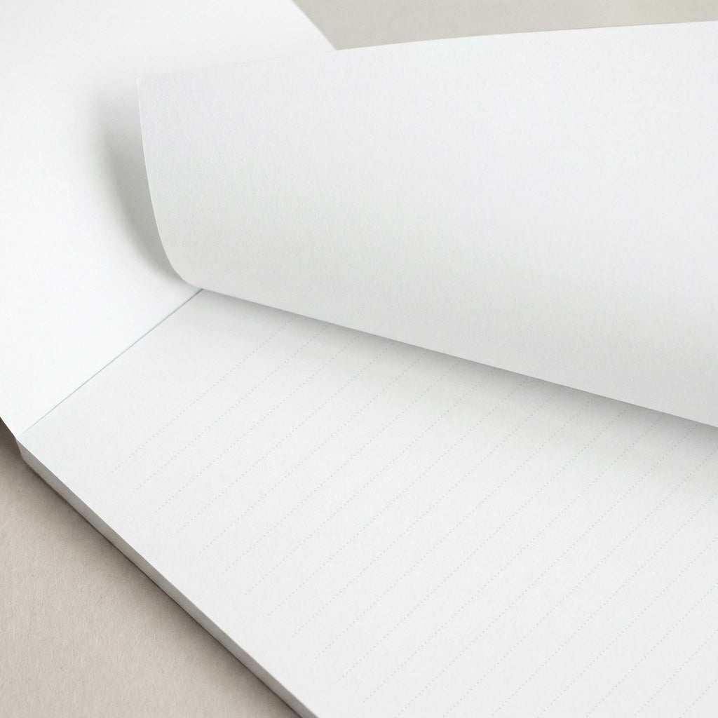 Elegant Green personalized notepad by Blú Rose, close-up of the lined pages with the top sheet lifted