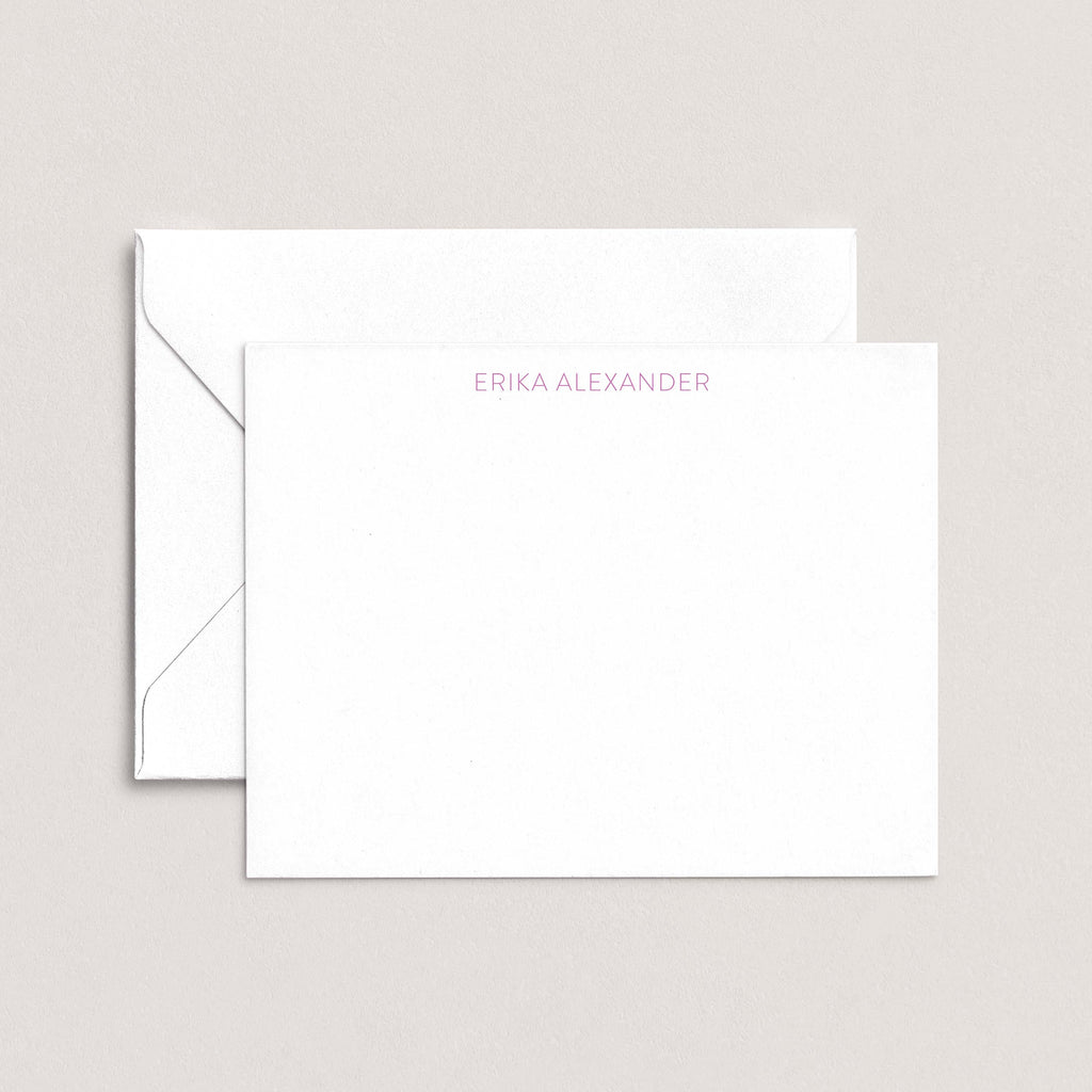 Personalized notecard with the name Erika Alexander in soft lavender font, paired with a white envelope on a neutral background.