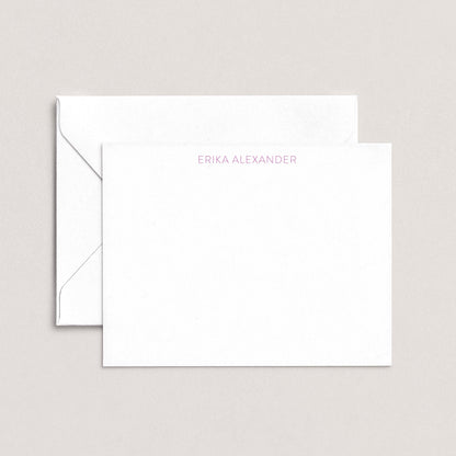 Personalized notecard with the name Erika Alexander in soft lavender font, paired with a white envelope on a neutral background.