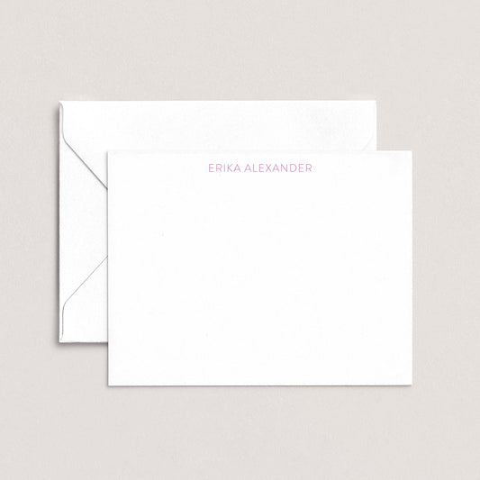 Personalized notecard with the name Erika Alexander in soft lavender font, paired with a white envelope on a neutral background.