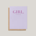 A lavender greeting card with text reading 'GIRL, YOU GOT THIS.' and a kraft paper envelope behind it, shown on a light gray background.