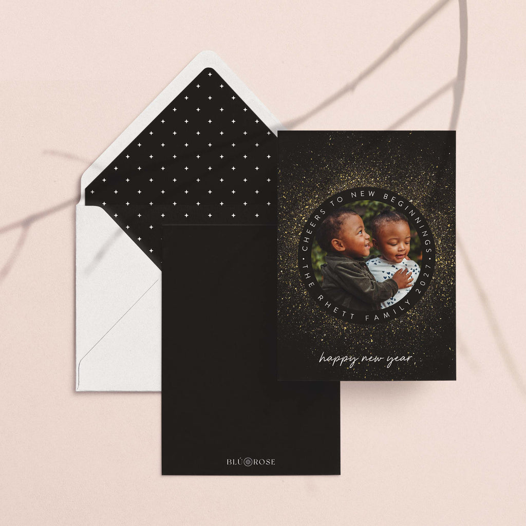 New Year Sparkle card with its black and gold dotted envelope liner on a neutral backdrop