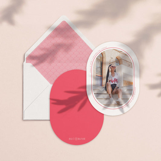 Minimal Geo grad announcement card with oval photo cutout shown with pink patterned envelope liner 