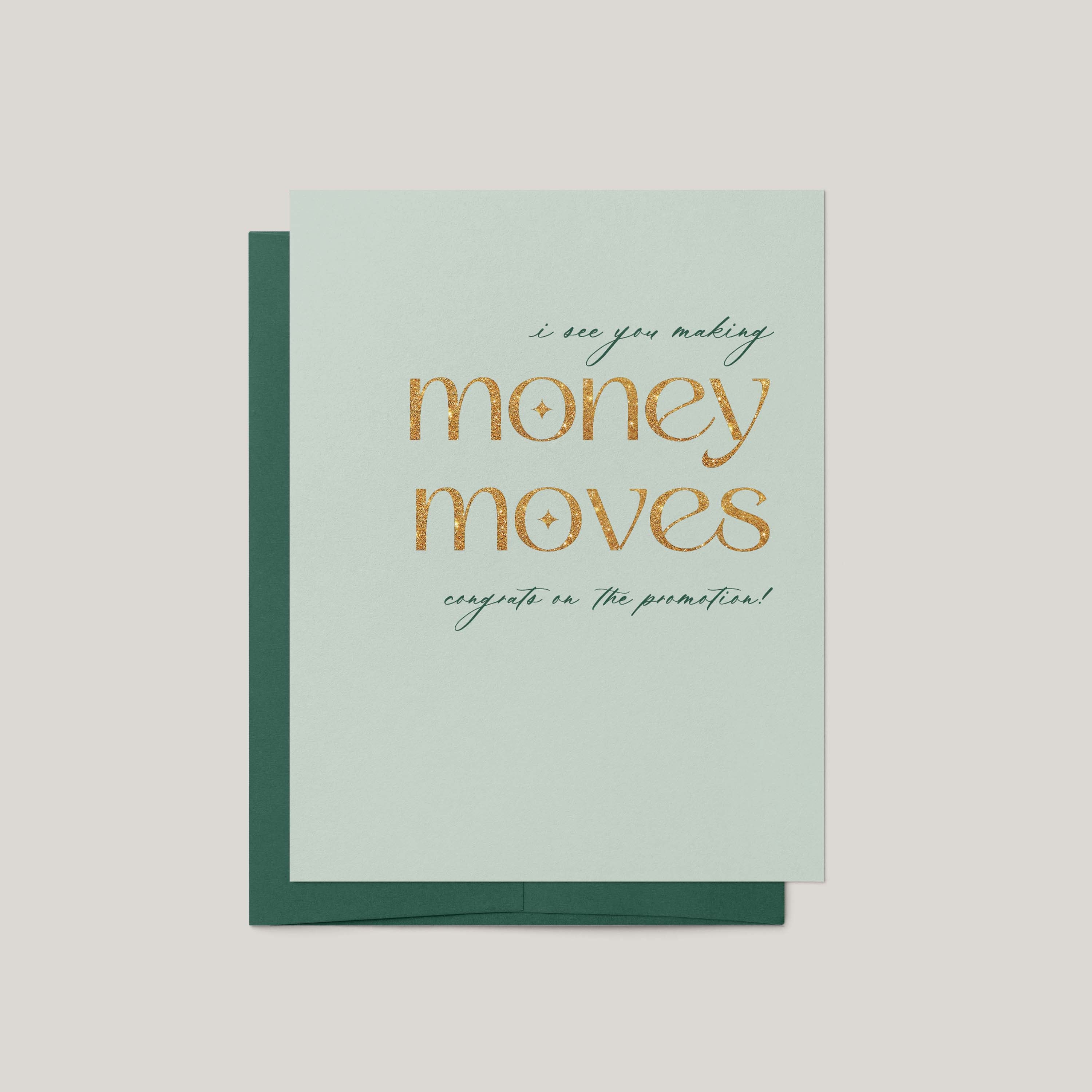 A mint green greeting card with a dark green envelope, featuring the text 'i see you making money moves' in gold glitter lettering and 'congrats on the promotion!' in dark green script.