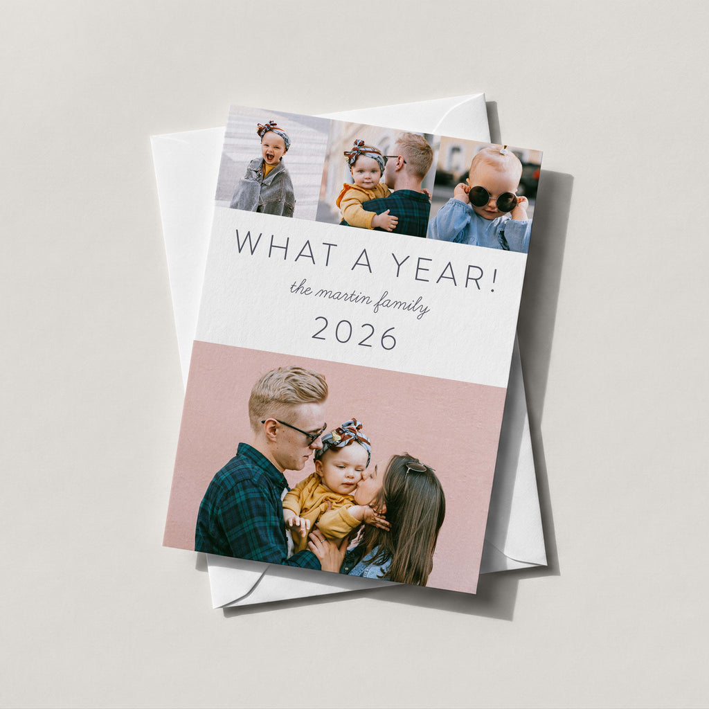 What a Year photo card with four family photos, blush panels and WHAT A YEAR in slate lettering