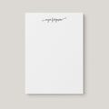 Acheila personalized notepad by Blú Rose, white notepad with the name 'Mya Ferguson' in delicate black script