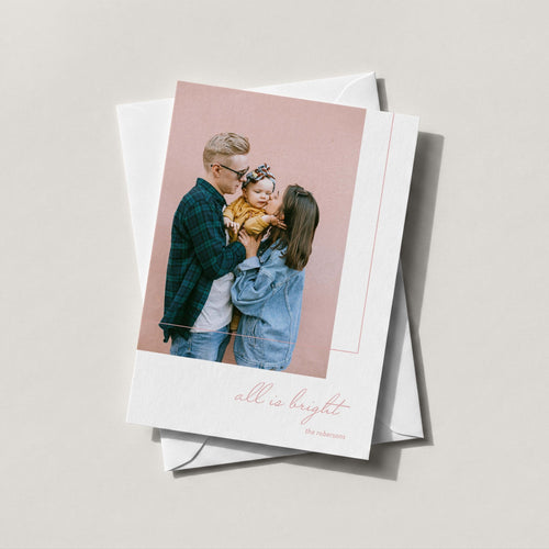 All is Bright photo card in dusty rose with a family portrait and all is bright in script