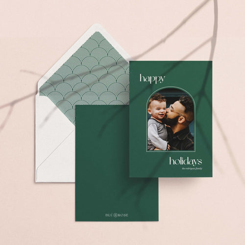 Arch Photo card with its green geometric envelope liner styled on a blush backdrop