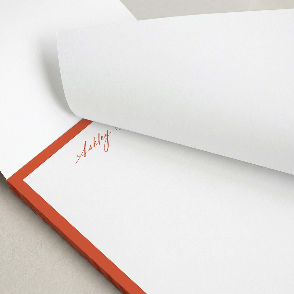 Ashley Border personalized notepad by Blú Rose, close-up of the rust border with the top sheet lifted