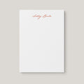 Ashley personalized notepad by Blú Rose, white notepad with the name 'Ashley Banks' in rust cursive script