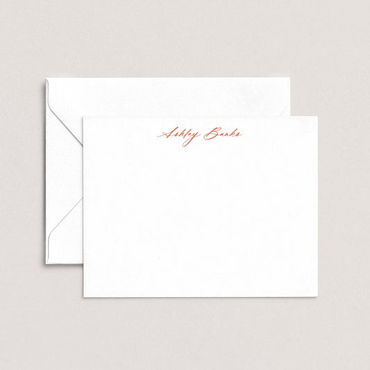 A white envelope with a personalized note inside, featuring the name "Ashley Bards" written in red cursive script.