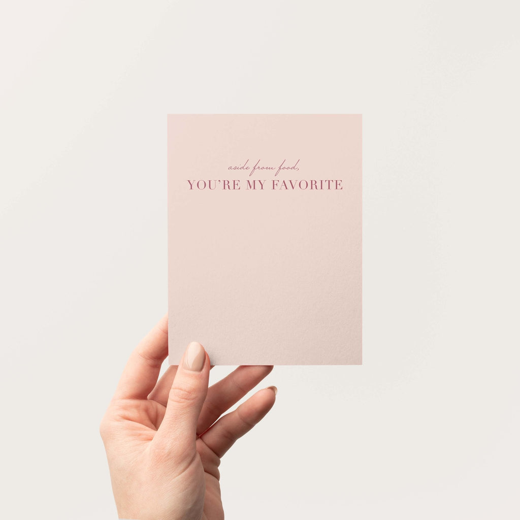 Aside From Food You're My Favorite card by Blú Rose held in hand against a neutral off-white background