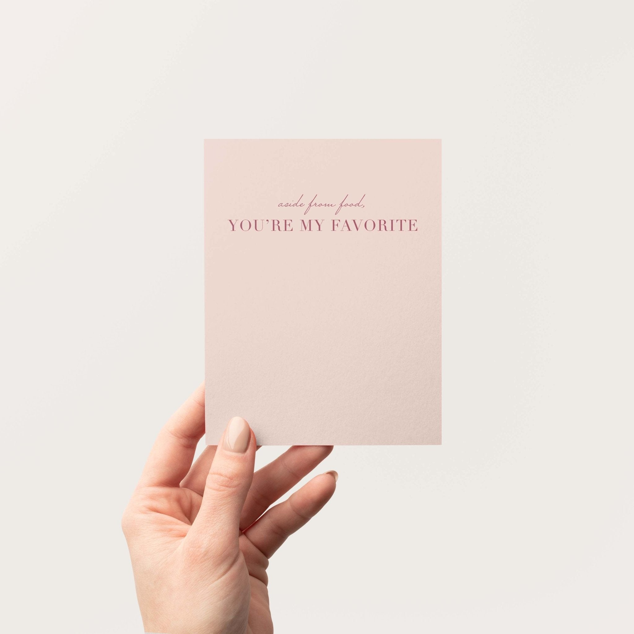 Aside From Food You're My Favorite card by Blú Rose held in hand against a neutral off-white background