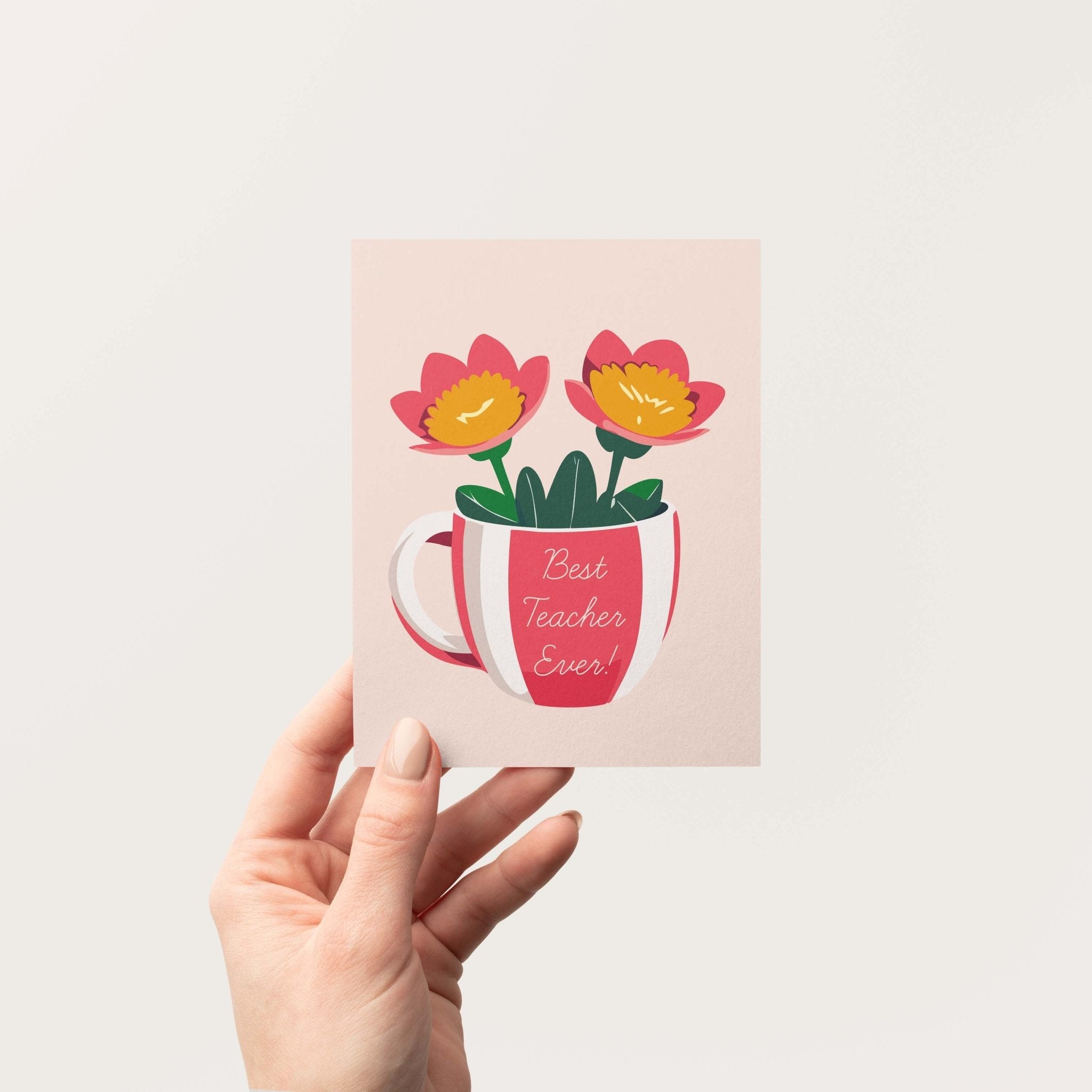 Best Teacher Ever teacher greeting card by Blú Rose held in hand against a neutral off-white background