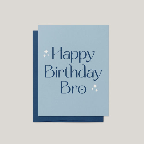Birthday Bro greeting card by Blú Rose, light blue card with navy Happy Birthday Bro text, shown with navy envelope