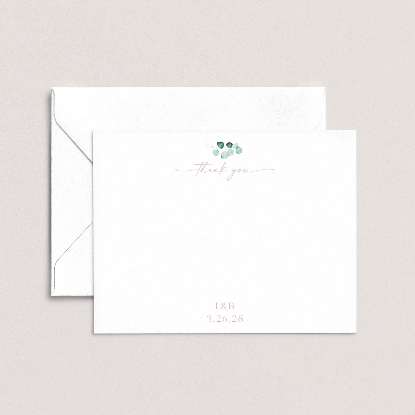 A white envelope with a cursive "Thank you" message and a date printed on it.