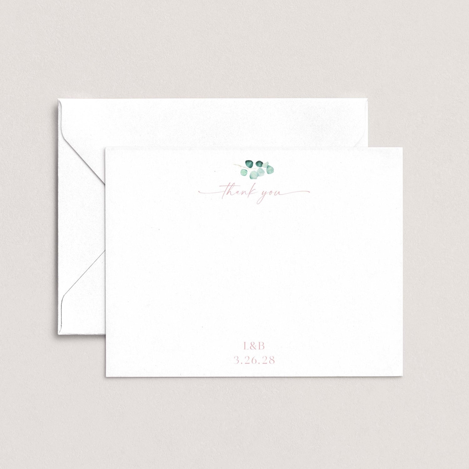 A white envelope with a cursive "Thank you" message and a date printed on it.