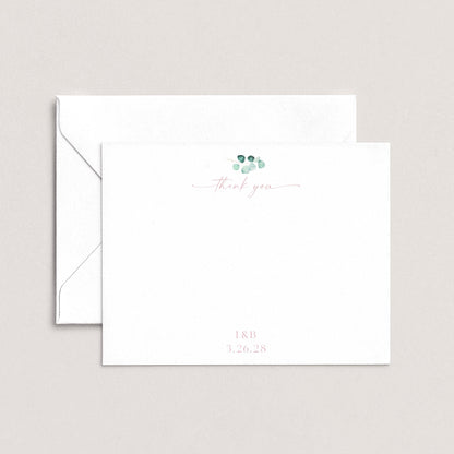 A white envelope with a cursive "Thank you" message and a date printed on it.