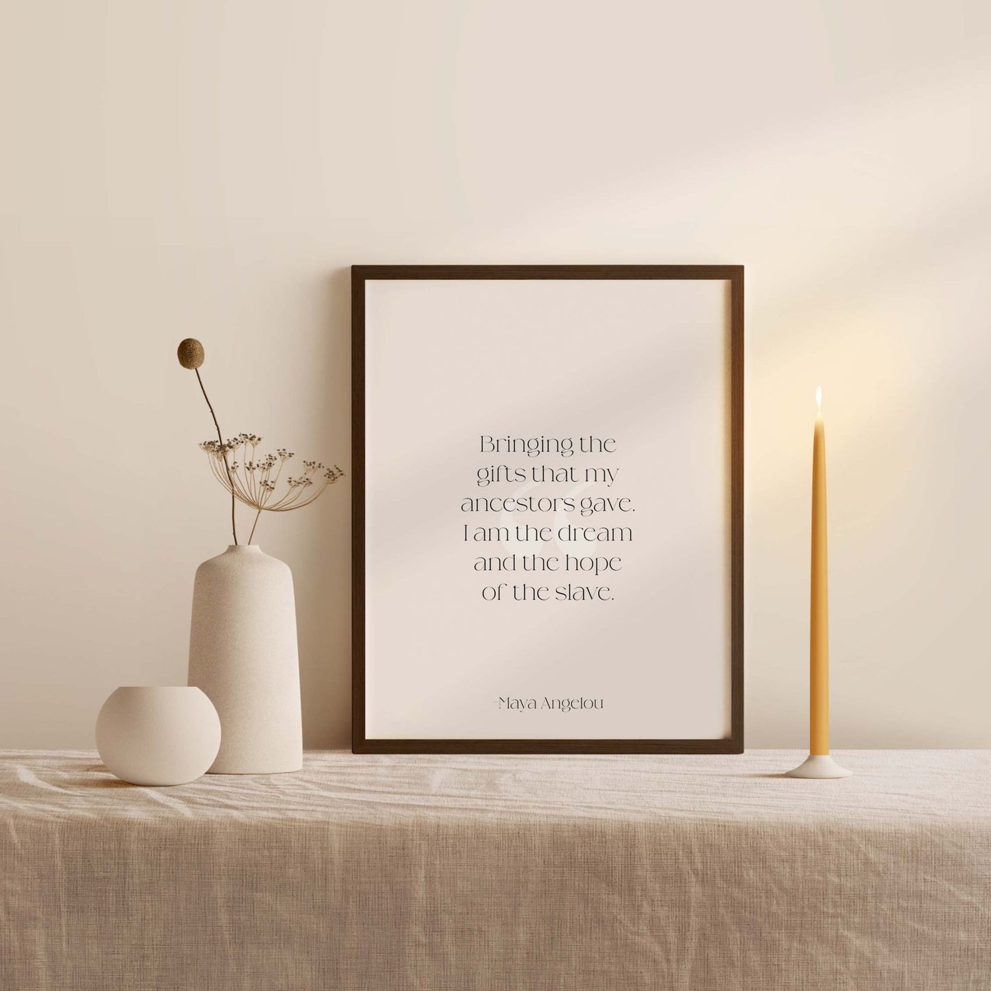 Maya Angelou quote wall art styled on neutral shelf with minimalist decor and soft lighting