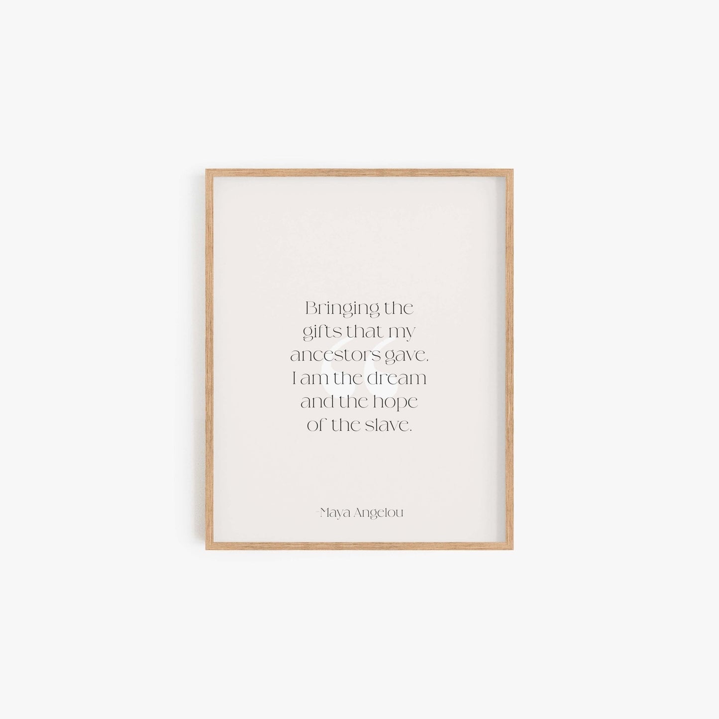 Maya Angelou quote art print reading Bringing the gifts that my ancestors gave I am the dream and the hope of the slave in light wood frame