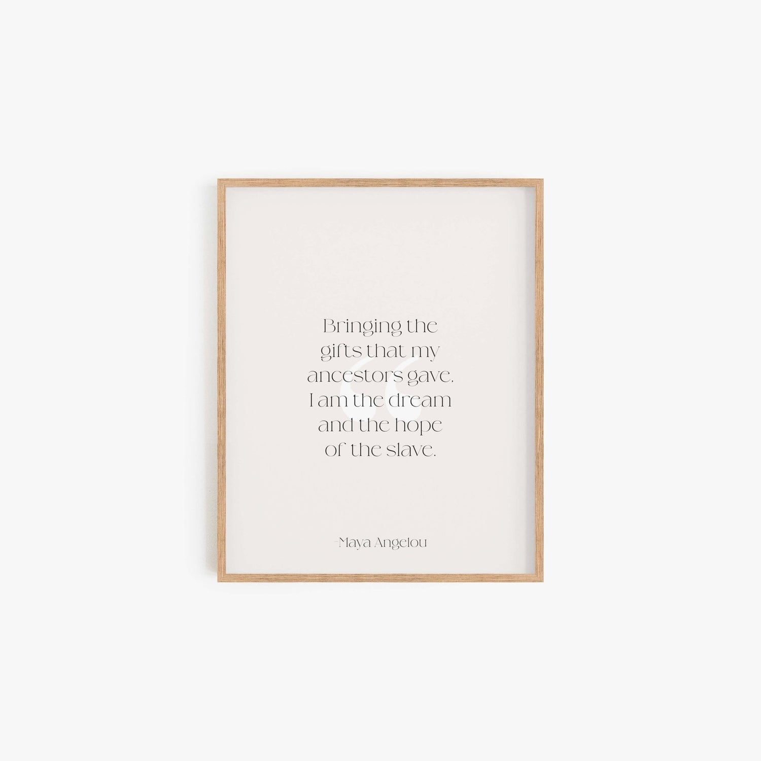 Maya Angelou quote art print reading Bringing the gifts that my ancestors gave I am the dream and the hope of the slave in light wood frame