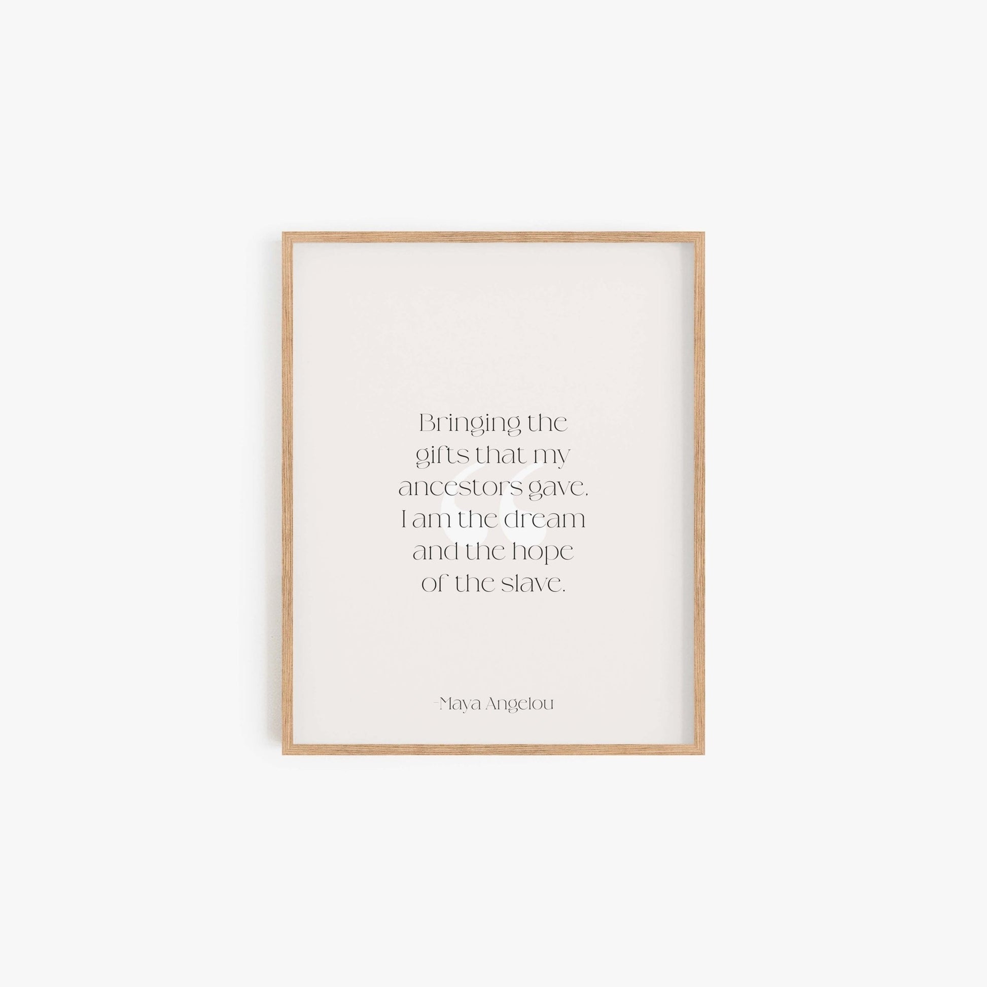 Maya Angelou quote art print reading Bringing the gifts that my ancestors gave I am the dream and the hope of the slave in light wood frame