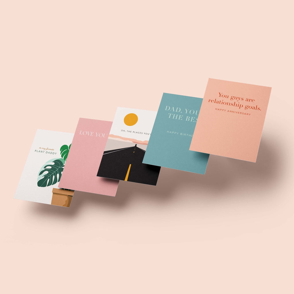 Card Squad membership gift by Blú Rose, fanned display of assorted greeting cards on a blush background