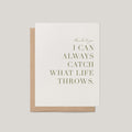 Catch What Life Throws thank you greeting card by Blú Rose, ivory card with sage green serif text, shown with kraft envelope
