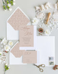 Chic & Sweet wedding invitation suite by Blú Rose, taupe invitation and reply card with script names, styled with taupe geometric-lined envelopes, ribbon, and a wax seal