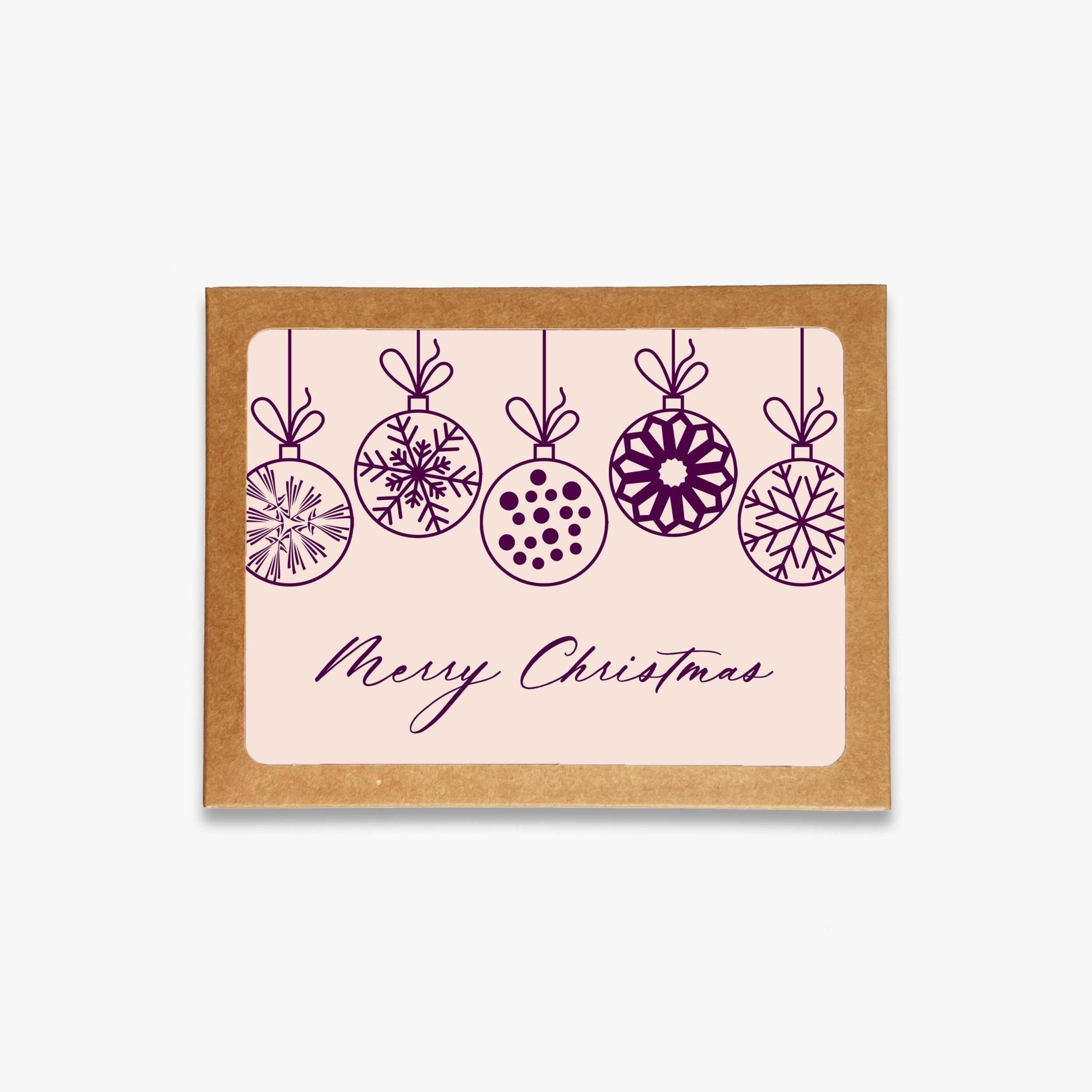 Christmas Ornaments Greeting Card Boxed Set featuring eight pink and plum cards with kraft envelopes in modern kraft packaging.