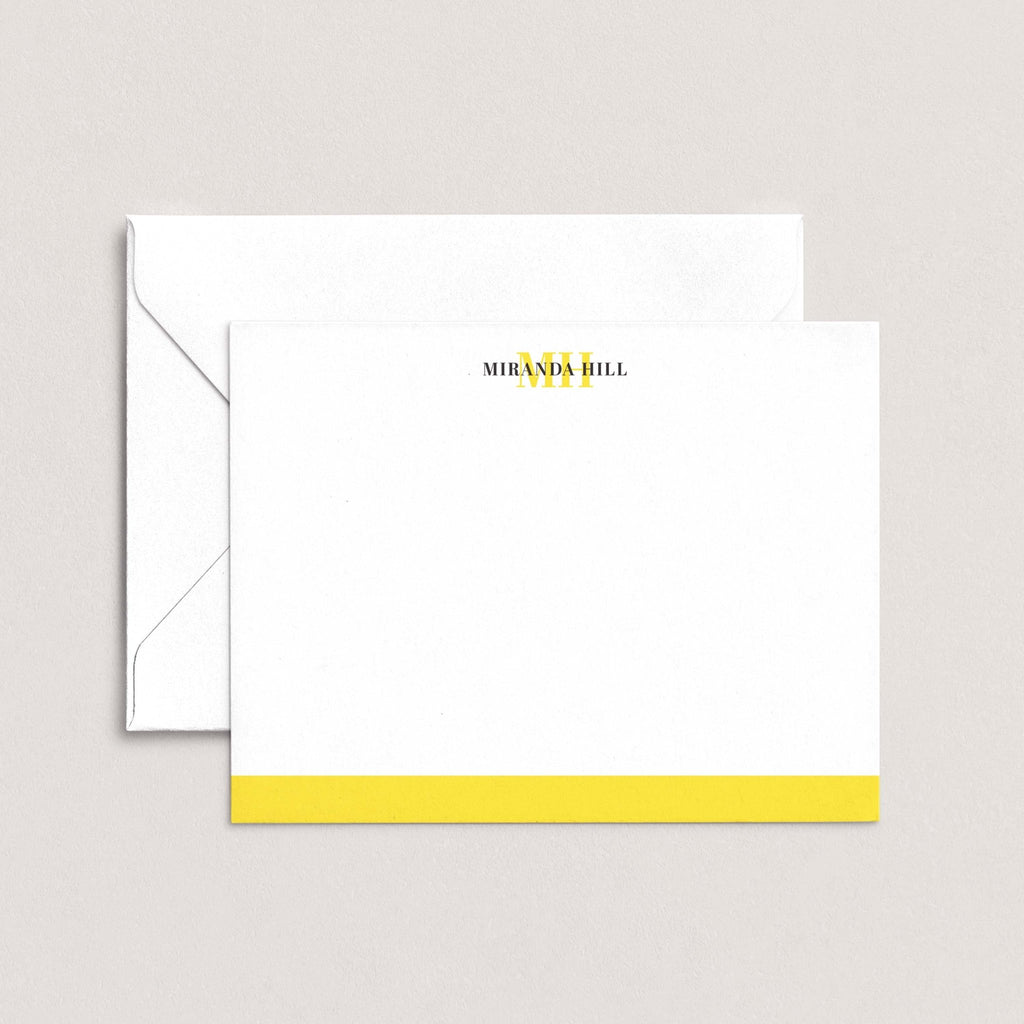 Color Bar personalized notecards by Blú Rose, white flat notecard with the name 'Miranda Hill', a yellow monogram and a yellow bottom color bar, shown with a coordinating white envelope