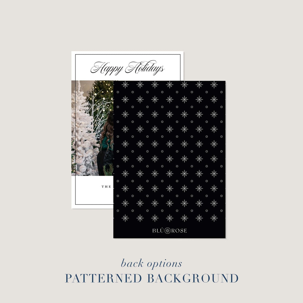 Holiday card shown with black patterned card back option featuring modern star design.