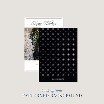 Holiday card shown with black patterned card back option featuring modern star design.