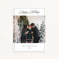 Chic family photo holiday card with black script Happy Holidays greeting and minimalist border.