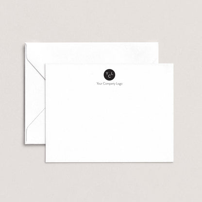 A white envelope with a black logo on the top right corner, sitting on top of a plain white background.