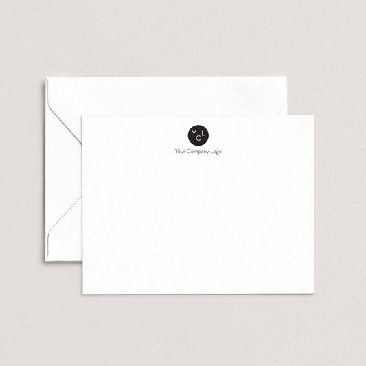 A white envelope with a black logo on the top right corner, sitting on top of a plain white background.