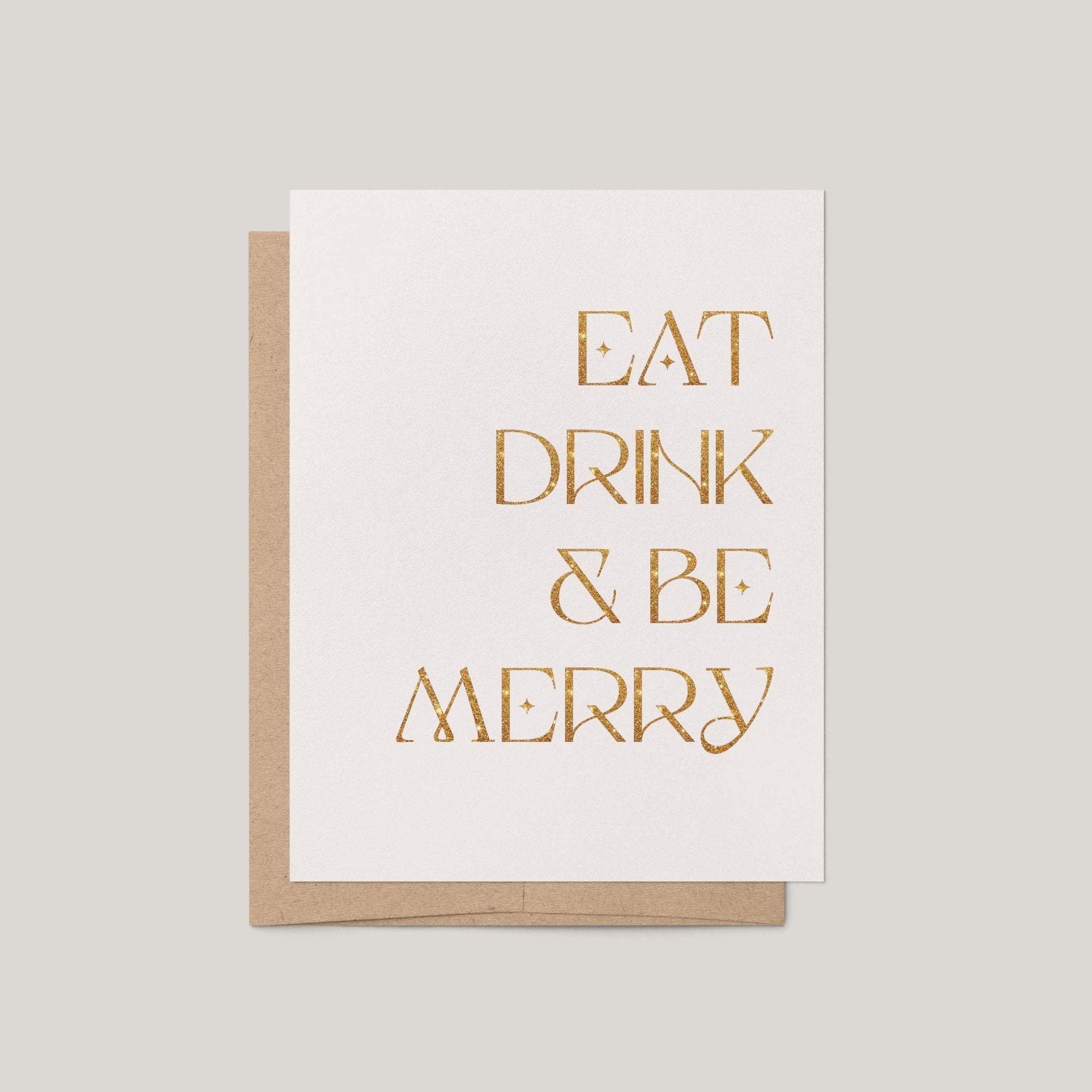 Eat, Drink & Be Merry holiday greeting card by Blú Rose, ivory card with gold glitter foil text, shown with kraft envelope