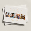 Elegant Four landscape photo card with four family photos and 2027 in gold across the top