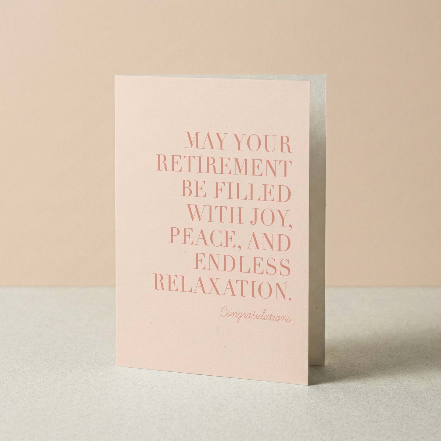 Greeting card with retirement wishes on a beige background