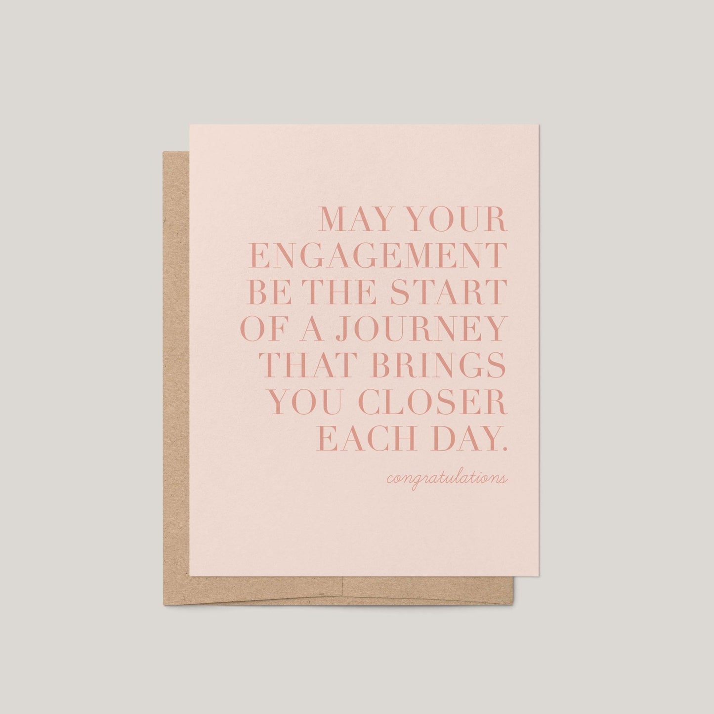 Greeting card with pink text on a light gray background