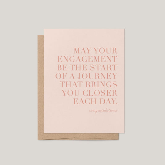 Greeting card with pink text on a light gray background