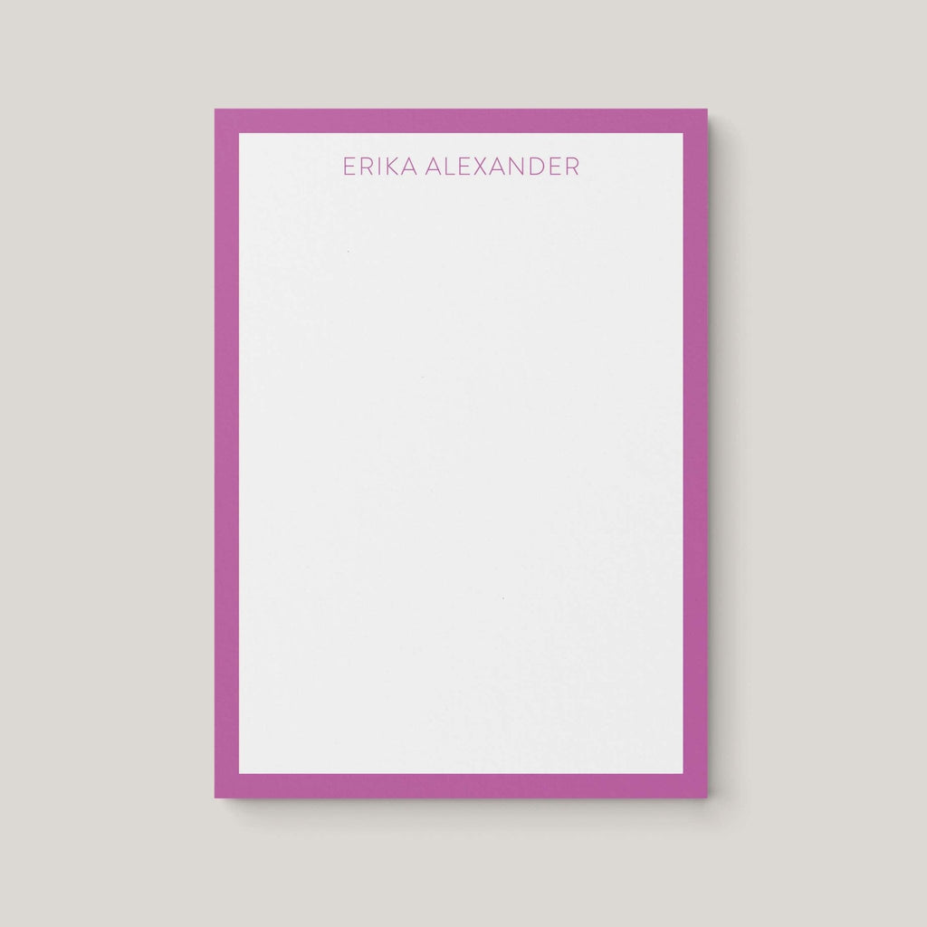Erika Border personalized notepad by Blú Rose, white notepad with an orchid border and the name 'Erika Alexander'