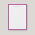 Erika Border personalized notepad by Blú Rose, white notepad with an orchid border and the name 'Erika Alexander'