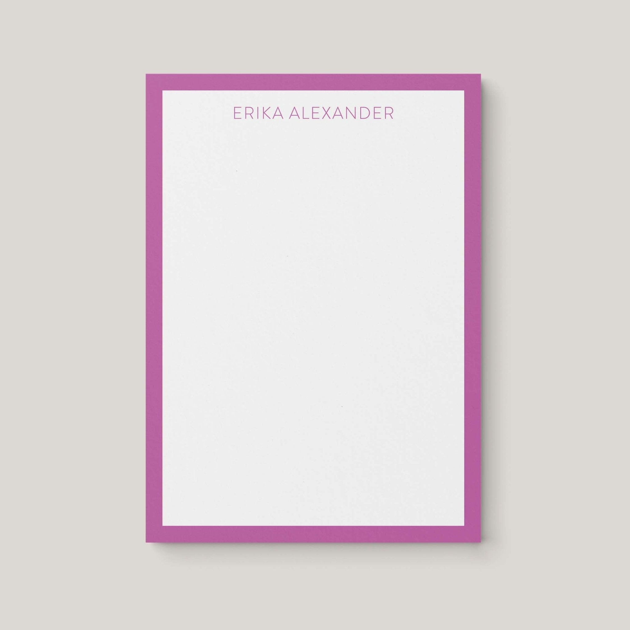 Erika Border personalized notepad by Blú Rose, white notepad with an orchid border and the name 'Erika Alexander'